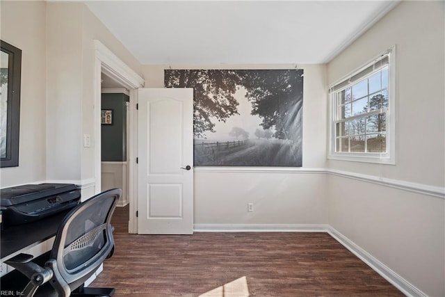 office with wood finished floors and baseboards