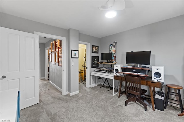 carpeted office with baseboards