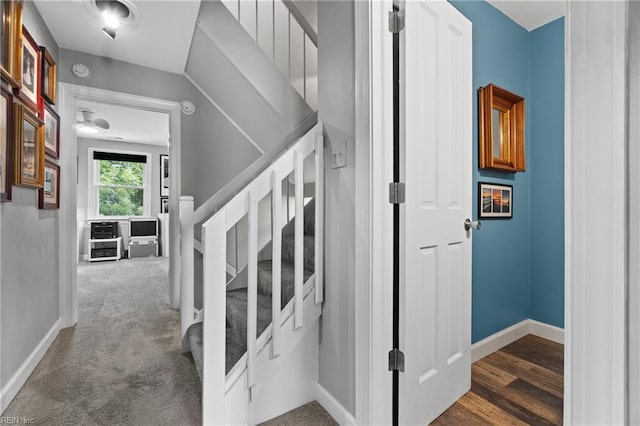 staircase with carpet and baseboards