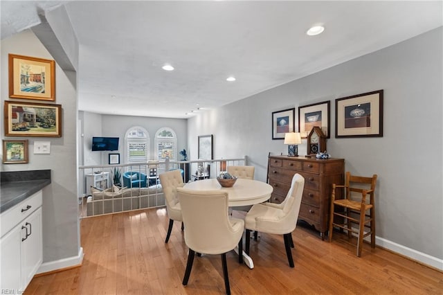 dining area featuring baseboards, recessed lighting, and light wood-style floors