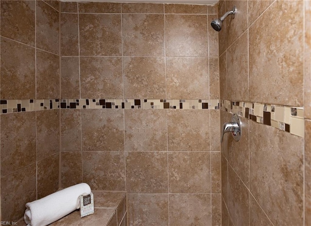 interior space with tiled shower