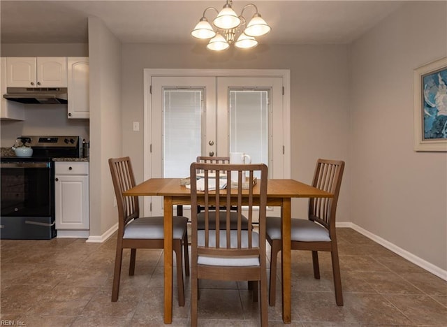 dining room featuring french doors, an inviting chandelier, and baseboards