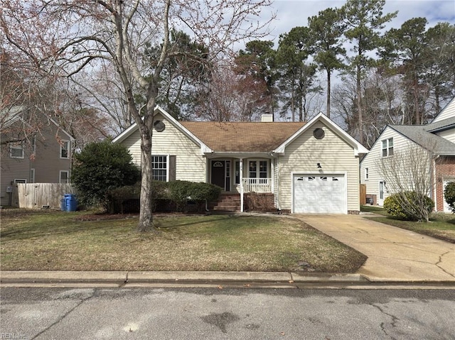 ranch-style home featuring a garage, driveway, a chimney, and a front yard