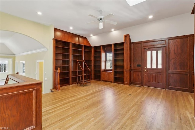 interior space featuring vaulted ceiling, recessed lighting, a ceiling fan, and light wood-style floors