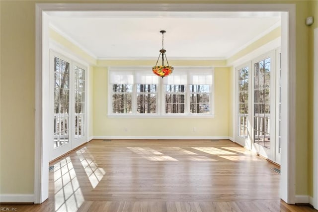 unfurnished sunroom with a healthy amount of sunlight