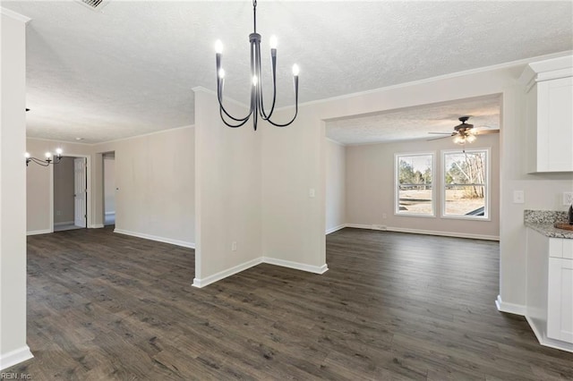 unfurnished dining area with baseboards, dark wood-type flooring, crown molding, a textured ceiling, and ceiling fan with notable chandelier