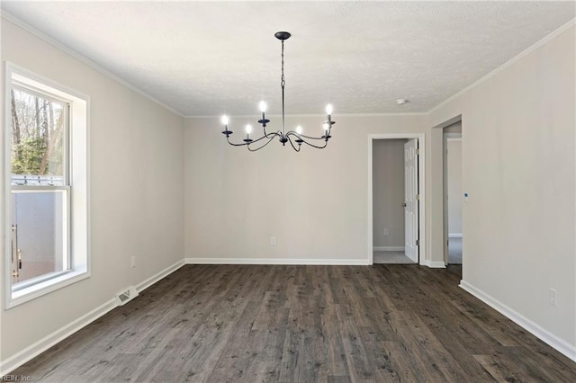 unfurnished dining area featuring ornamental molding, visible vents, and dark wood finished floors