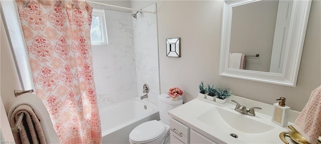 bathroom featuring shower / bath combo, vanity, and toilet