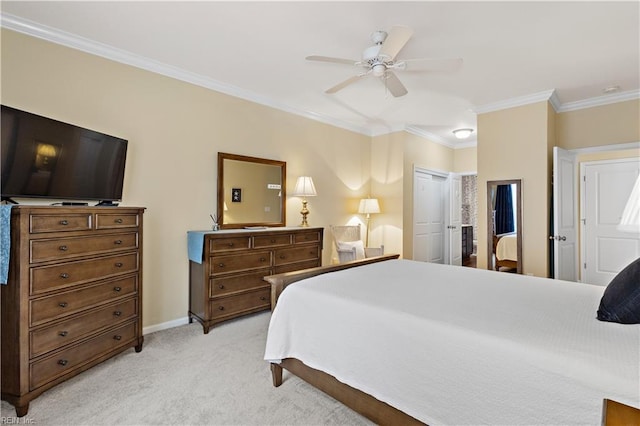 bedroom with crown molding, a closet, light colored carpet, a ceiling fan, and baseboards