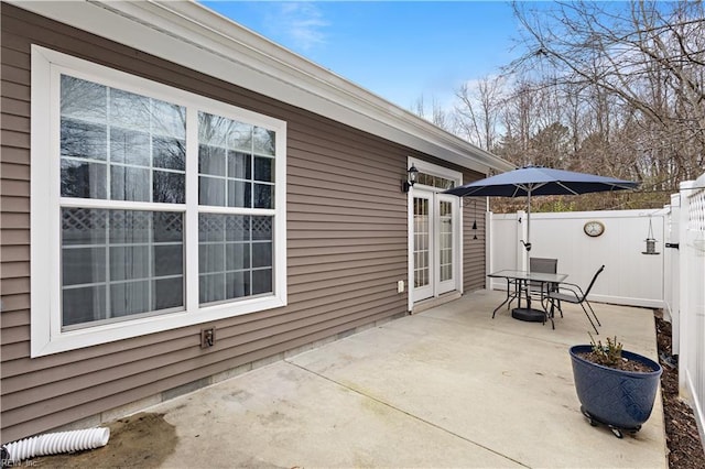 view of patio / terrace featuring outdoor dining space and fence