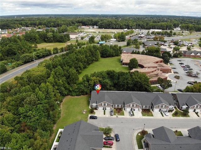 birds eye view of property with a residential view