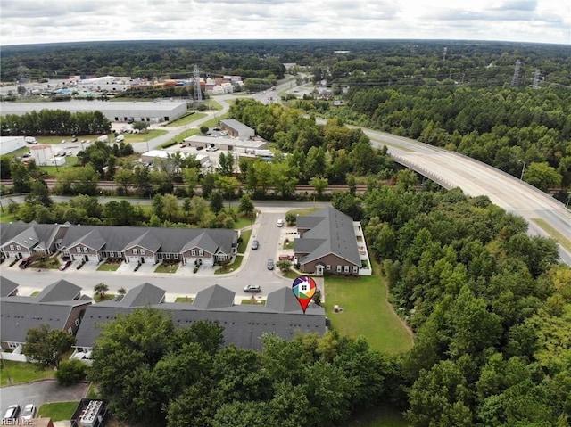 bird's eye view featuring a residential view and a view of trees