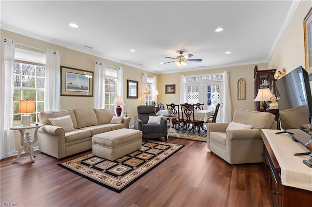 living area with dark wood-type flooring, recessed lighting, and ornamental molding