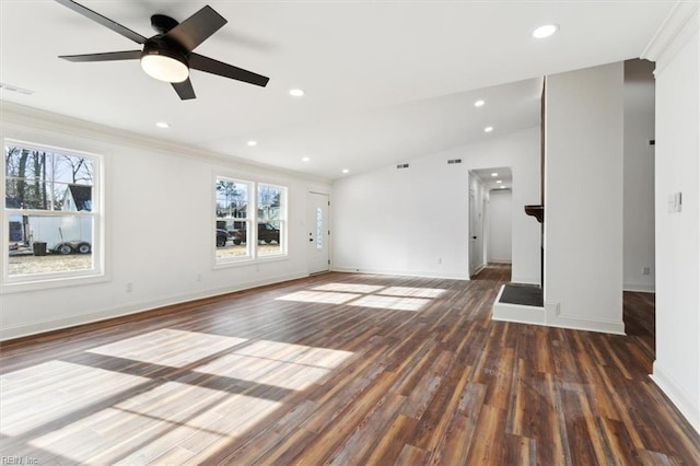 unfurnished living room with recessed lighting, visible vents, vaulted ceiling, wood finished floors, and baseboards