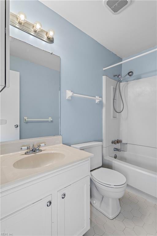 full bathroom with visible vents, toilet, tile patterned floors, vanity, and shower / washtub combination