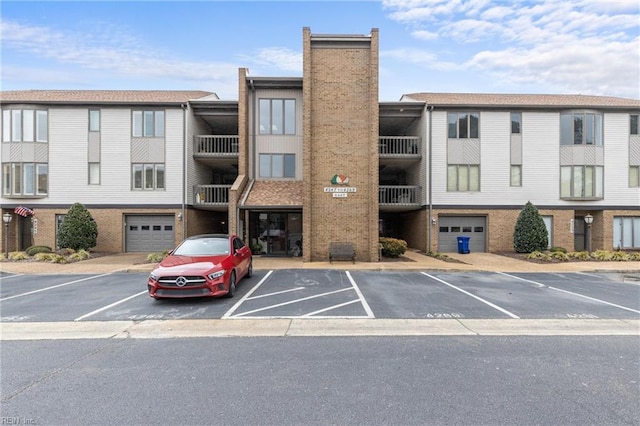 view of property with uncovered parking