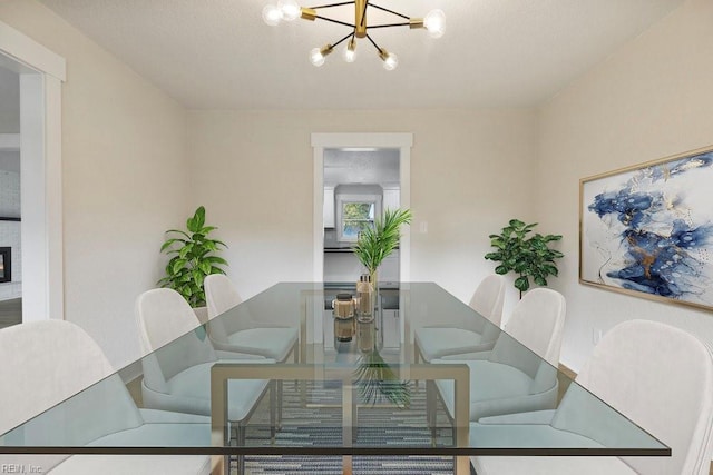 dining space with a notable chandelier