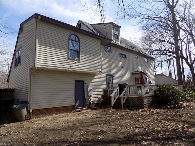 rear view of property with a deck