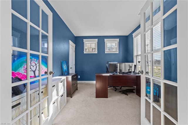 office with carpet floors, french doors, and baseboards