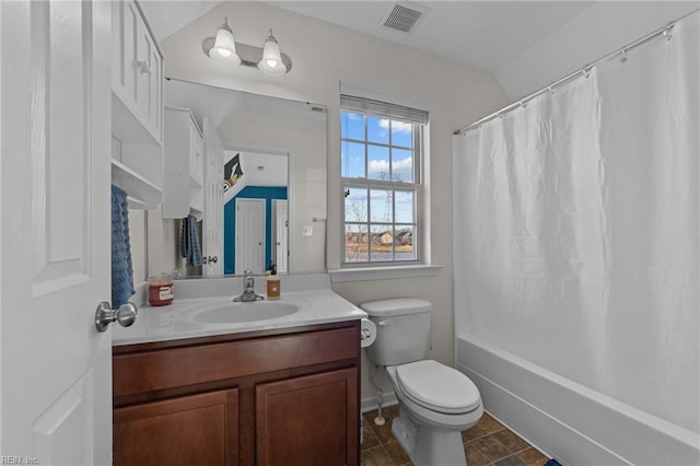 full bathroom with toilet, shower / tub combo, visible vents, and vanity