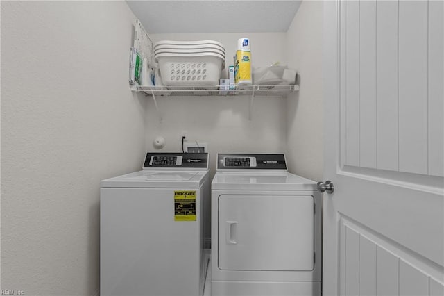 laundry room with laundry area and separate washer and dryer