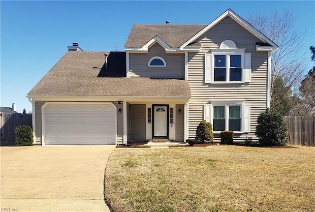 traditional-style home featuring a garage, a shingled roof, fence, driveway, and a front yard