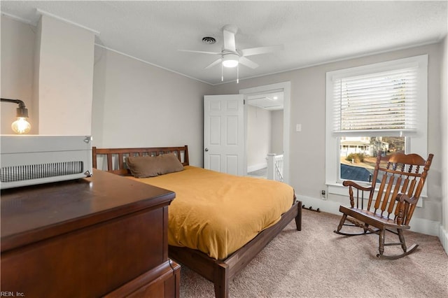 bedroom featuring light carpet and visible vents