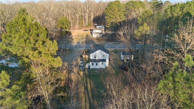 aerial view with a wooded view