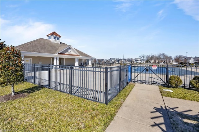 exterior space with a residential view and fence