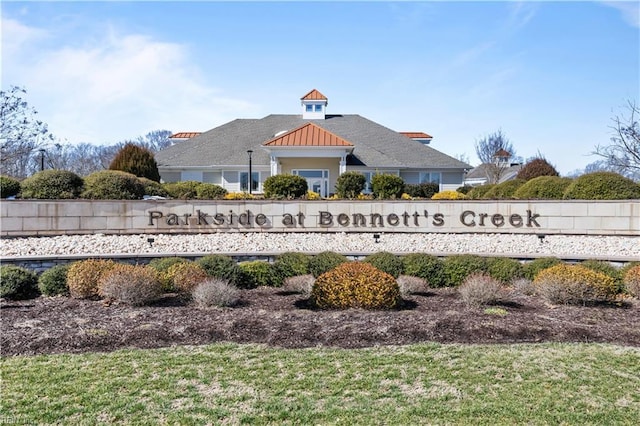 view of community sign