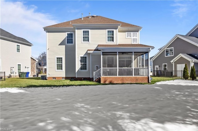 back of house with a yard, central air condition unit, a sunroom, crawl space, and fence