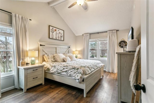 bedroom featuring lofted ceiling with beams, dark wood-style floors, baseboards, and a ceiling fan