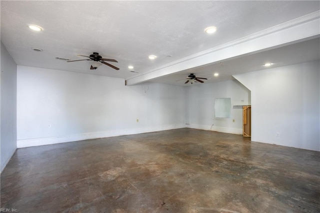 empty room with visible vents, ceiling fan, beamed ceiling, concrete floors, and recessed lighting