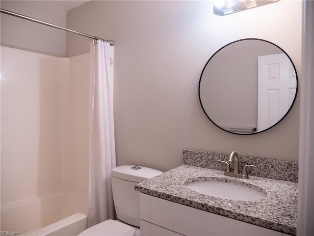 full bathroom featuring vanity and toilet