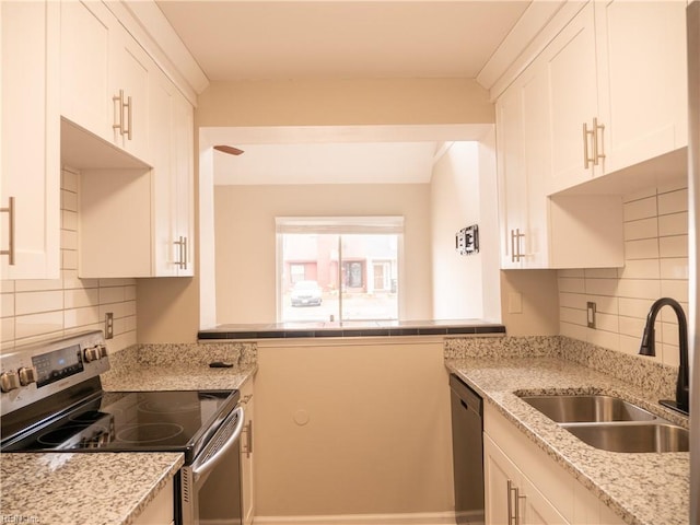 kitchen featuring a sink, dishwashing machine, white cabinets, and electric stove