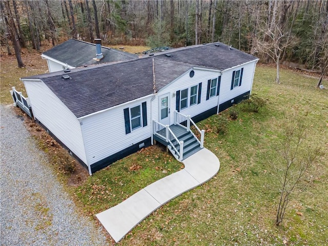 aerial view featuring a wooded view