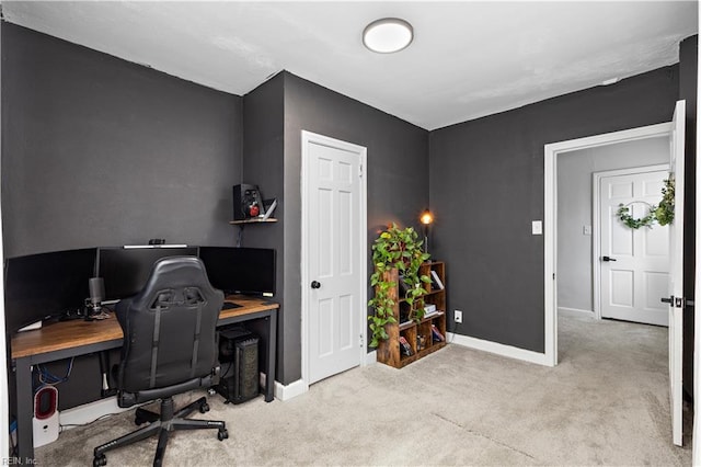 office featuring carpet floors and baseboards