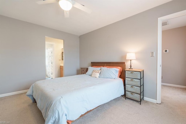 bedroom featuring light carpet, baseboards, visible vents, and a ceiling fan