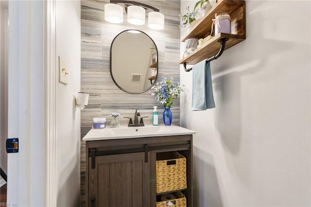 bathroom featuring visible vents and vanity