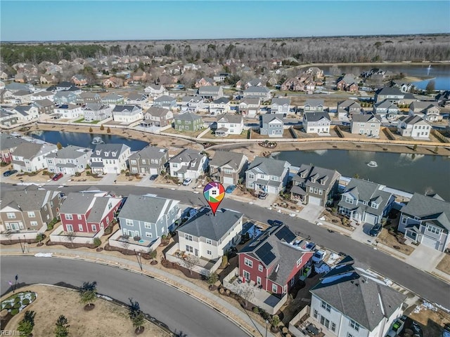 aerial view featuring a water view and a residential view