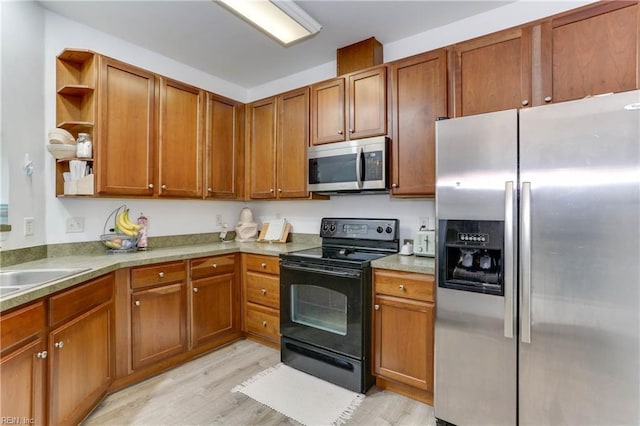 kitchen with stainless steel appliances, light wood-type flooring, brown cabinetry, and open shelves