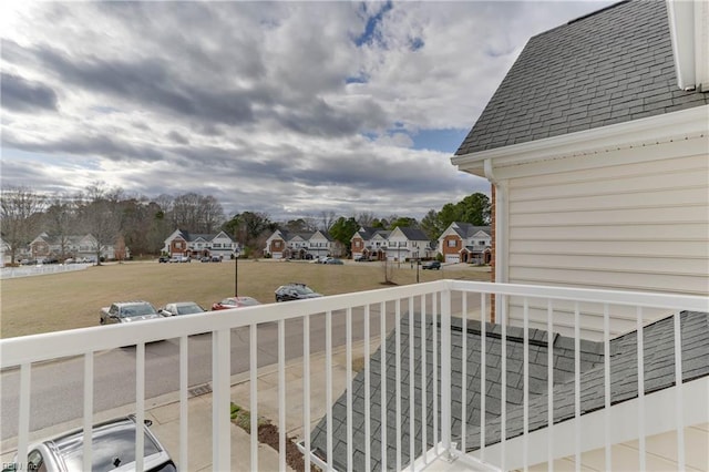 balcony featuring a residential view