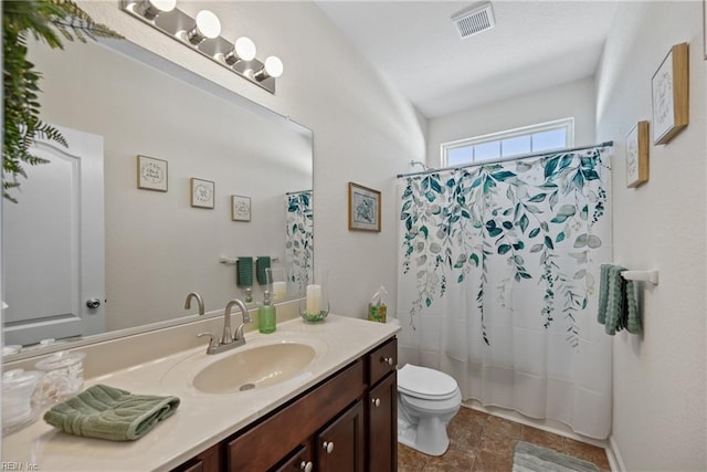 full bathroom featuring shower / bath combination with curtain, visible vents, vanity, and toilet