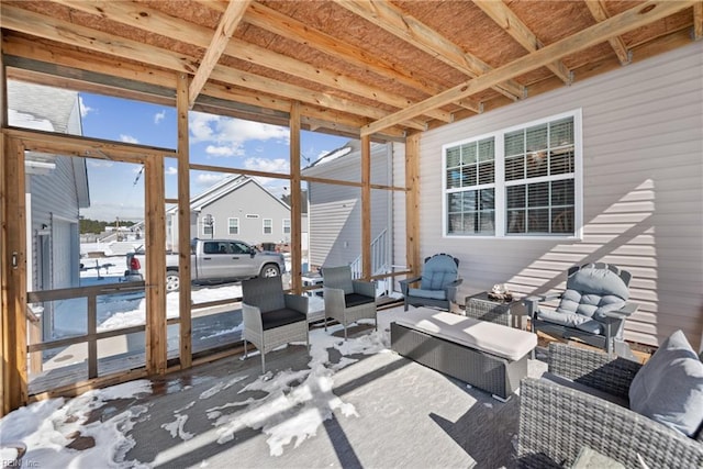 sunroom / solarium with a residential view