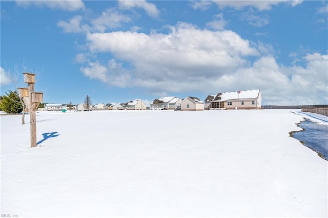 view of yard covered in snow