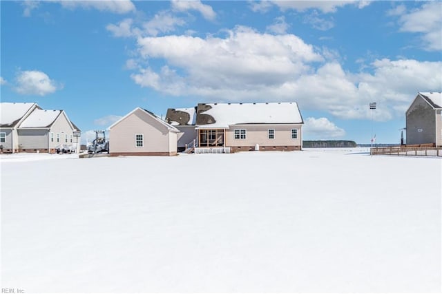 view of snow covered property