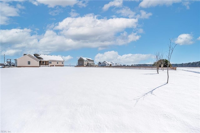 view of yard covered in snow