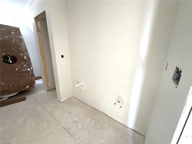 bathroom with unfinished concrete flooring