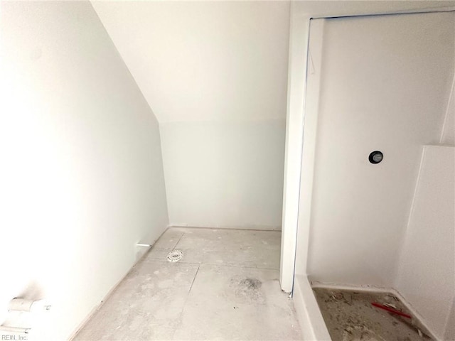 bathroom with vaulted ceiling