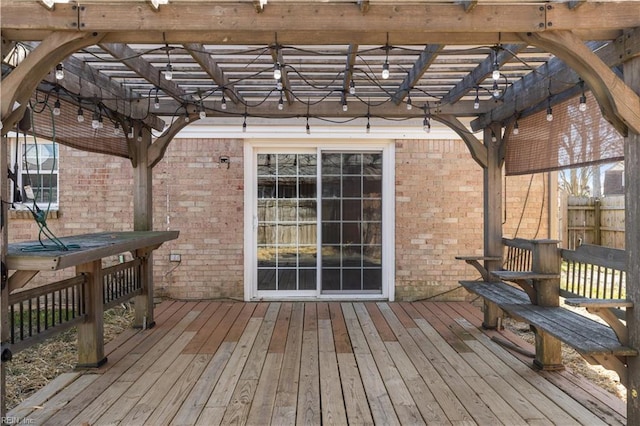 wooden terrace with a pergola